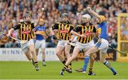 5 May 2013; Aidan Fogarty, Kilkenny, picks up a loose ball from team-mates Michael Rice and Lester Ryan and Tipperary's Lar Corbett. Allianz Hurling League Division 1 Final, Kilkenny v Tipperary, Nowlan Park, Kilkenny. Picture credit: Brendan Moran / SPORTSFILE