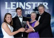4 May 2013; Aaron Deverell picked up the Canterbury Club Player of the Year after being an integral part of Tullamore's Cleaning Contractors Provincial Towns Cup winning team. Aaron captained Tullamore to unprecedented success in 2012-13 as they racked up an impressive five cups to adorn the trophy cabinet in their Spollanstown clubhouse. As out half he orchestrated a back line that improved significantly, game on game as the season progressed. After appearing in three heart-breaking Towns Cup Final defeats in recent years the 28-year old Junior interprovincial gave a man of the match performance in magnificently leading his side to a richly-fulfilling Towns Cup victory against Longford, and with his rounded kicking and running game he will surely thrive on the national stage over the coming years. A popular and unanimous choice for Club Player of the Year. With Aaron is his girlfriend Sharon O'Donnell and parents Linda and Henry. For more information log on to www.leinsterrugby.ie. Leinster Rugby Awards Ball 2013, The Mansion House, Dublin. Picture credit: Brendan Moran / SPORTSFILE