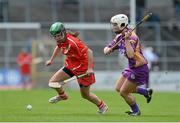 5 May 2013; Julia White, Cork, in action against Karen Atkinson, Wexford. Irish Daily Star National Camogie League Div 1 Final, Cork v Wexford, Nowlan Park, Kilkenny. Picture credit: Brendan Moran / SPORTSFILE