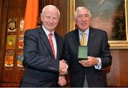7 May 2013; Ireland's Olympic medallists from the London 2012 Olympic Games were presented with their International Olympic Committee lapel pins at a special ceremony in the Mansion House Dublin. Pictured is Ronnie Delany receiving the Olympic Council of Ireland Medal of Honour from Pat Hickey, President, Olympic Council of Ireland. Mansion House, Dublin. Picture credit: Brendan Moran / SPORTSFILE