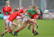 11 May 2013; Sarah Rowe, Mayo, in action against Deirdre O'Reilly, right, and Aisling Barrett, Cork. TESCO HomeGrown Ladies National Football League, Division 1 Final, Cork v Mayo, Parnell Park, Donnycarney, Dublin. Picture credit: Barry Cregg / SPORTSFILE