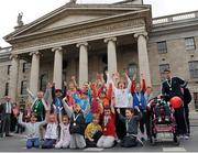 12 May 2013; Lord Mayor of Dublin Naoise Ó Muirí with Irish athletes Olive Loughnane, left, Siobhan Eviston, right, and children from all over Dublin who took part in the Lord Mayors Mile during the Lord Mayors Dublin City Street Athletics. O’Connell Street, Dublin. Picture credit: Pat Murphy / SPORTSFILE