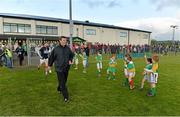 12 May 2013; Cork manager Jimmy Barry Murphy is applauded onto the pitch by members of the Cloughduv U6's and U8's as they form a guard of honour before the game. Official Opening of New Cloughduv GAA Complex, Cork v Tipperary, Fr.O'Driscoll Park, Cloughduv, Co. Cork. Picture credit: Brendan Moran / SPORTSFILE