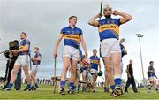 12 May 2013; Tipperary captain Brendan Maher, Shane Bourke, 13, and Timmy Hammersley, left, get ready for the fame after sitting for a team photograph. Official Opening of New Cloughduv GAA Complex, Cork v Tipperary, Fr.O'Driscoll Park, Cloughduv, Co. Cork. Picture credit: Brendan Moran / SPORTSFILE