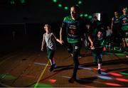 30 October 2017; Kieran Donaghy of Garvey's Tralee Warriors makes his way onto the court with mascots prior to the Basketball Ireland Men's Superleague match between Garveys Tralee Warriors and Eanna BC at Tralee Sports Complex in Tralee, Kerry. Photo by Brendan Moran/Sportsfile