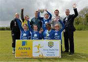 16 May 2013; Tiegan Ruddy, captain, Scoil Mochua, Celbridge, Co. Kildare, lifts the cup with her team-mates along with Alan Kavanagh, Executive Manager, Aviva Health, right, and Kealan Dillon, Hull City, back row third from left, after winning Girl's Section B. Aviva Health FAI Primary School 5's, Leinster Finals, MDL Grounds, Trim Road, Navan, Co. Meath. Picture credit: Brian Lawless / SPORTSFILE