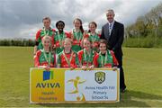 16 May 2013; Alan Kavanagh, Executive Manager, Aviva Health, with the St. Fiacc's primary School, Graiguecullen, Co. Carlow, team who were runners up in the Girl's Section B. Aviva Health FAI Primary School 5's, Leinster Finals, MDL Grounds, Trim Road, Navan, Co. Meath. Picture credit: Brian Lawless / SPORTSFILE