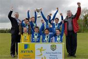 16 May 2013; Alan Kavanagh, Executive Manager, Aviva Health, left, with Monastery N S. Ardee Co. Louth, with the cup for the Boy's Section B. Aviva Health FAI Primary School 5's, Leinster Finals, MDL Grounds, Trim Road, Navan, Co. Meath. Picture credit: Brian Lawless / SPORTSFILE