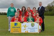 16 May 2013; Alan Kavanagh, Executive Manager, Aviva Health, with the Durrow NS, Tullamore, Co. Offaly, after they finished runners up in the Girl's Section A. Aviva Health FAI Primary School 5's, Leinster Finals, MDL Grounds, Trim Road, Navan, Co. Meath. Picture credit: Brian Lawless / SPORTSFILE