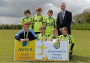 16 May 2013; Alan Kavanagh, Executive Manager, Aviva Health, with the Gaelscoil an Inbhir Mhóir, Co. Wicklow, team, who were runners up in the Boy's Section B. Aviva Health FAI Primary School 5's, Leinster Finals, MDL Grounds, Trim Road, Navan, Co. Meath. Picture credit: Brian Lawless / SPORTSFILE
