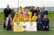 16 May 2013; The St Patricks Boys National School, Carndonagh, Innishowen, Co. Donegal, team, pictured with Cathal Sheridan, Aviva, and Alex Harkin, FAI Schools treasurer, celebrate after winning Boy's Section B. Aviva Health FAI Primary School 5's, Ulster Finals, Monaghan United FC, Gortakeegan, Monaghan. Picture credit: Oliver McVeigh / SPORTSFILE