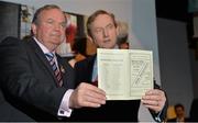 17 May 2013; An Taoiseach Enda Kenny, T.D., with Uachtarán Chumann Lúthchleas Gael Liam Ó Néill, and a match programme from the 1936 All-Ireland Football Final between Laois and Mayo, at the official unveiling of the newly-refurbished GAA Museum at Croke Park. The final phase of renovation now includes the official GAA Hall of Fame, a modern-day heroes and legends gallery, eight exciting interactive skill zones and dedicated sound booths showcasing clips from the association’s oral history archive. The museum boasts a vast collection of objects that illustrate the development of Gaelic games from ancient times to the present day.  Admission to the GAA Museum and Stadium Tour is priced at €12.00 for an adult, €8.00 for a child under 12, €32.00 for a family, 2 adults & 2 children, and €9.00 for students and senior citizens. For further information visit www.crokepark.ie/gaa-museum or www.facebook.com/CrokePark. GAA Museum, Croke Park, Dublin. Picture credit: Brendan Moran / SPORTSFILE