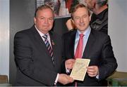 17 May 2013; An Taoiseach Enda Kenny, T.D., with Uachtarán Chumann Lúthchleas Gael Liam Ó Néill, and a match programme from the 1936 All-Ireland Football Final between Laois and Mayo, at the official unveiling of the newly-refurbished GAA Museum at Croke Park. The final phase of renovation now includes the official GAA Hall of Fame, a modern-day heroes and legends gallery, eight exciting interactive skill zones and dedicated sound booths showcasing clips from the association’s oral history archive. The museum boasts a vast collection of objects that illustrate the development of Gaelic games from ancient times to the present day.  Admission to the GAA Museum and Stadium Tour is priced at €12.00 for an adult, €8.00 for a child under 12, €32.00 for a family, 2 adults & 2 children, and €9.00 for students and senior citizens. For further information visit www.crokepark.ie/gaa-museum or www.facebook.com/CrokePark. GAA Museum, Croke Park, Dublin. Picture credit: Brendan Moran / SPORTSFILE