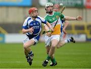 18 May 2013; Mark Kavanagh, Laois, in action against Ben Conneely, Offaly. Electric Ireland Leinster GAA Hurling Minor Championship Quarter-Final, Laois v Offaly, O'Moore Park, Portlaoise, Co. Laois. Picture credit: Diarmuid Greene / SPORTSFILE