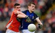 19 May 2013; Donal Monahan, Cavan, in action against Gregory McCabe, Armagh. Electric Ireland Ulster GAA Football Minor Championship, First Round, Cavan v Armagh, Kingspan Breffni Park, Cavan. Picture credit: Ray McManus / SPORTSFILE
