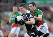 19 May 2013; Cathal Brennan, Sligo, in action against Barry Leonard, Mayo. Connacht GAA Football Junior Championship Final, Mayo v Sligo, Pearse Stadium, Galway. Picture credit: Brian Lawless / SPORTSFILE