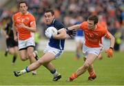 19 May 2013; Eugene Keating, Cavan, in action against Brendan Donaghy, Armagh. Ulster GAA Football Senior Championship, Preliminary Round, Cavan v Armagh, Kingspan Breffni Park, Cavan. Picture credit: Oliver McVeigh / SPORTSFILE