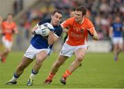 19 May 2013; Eugene Keating, Cavan, in action against Brendan Donaghy, Armagh. Ulster GAA Football Senior Championship, Preliminary Round, Cavan v Armagh, Kingspan Breffni Park, Cavan. Picture credit: Oliver McVeigh / SPORTSFILE