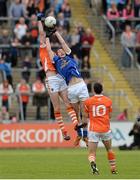 19 May 2013; James Lavery, Armagh, in action against David Givney, Cavan. Ulster GAA Football Senior Championship, Preliminary Round, Cavan v Armagh, Kingspan Breffni Park, Cavan. Picture credit: Oliver McVeigh / SPORTSFILE