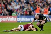 19 May 2013; Referee Marty Duffy checks on Michael Meehan, Galway, during the match. Connacht GAA Football Senior Championship Quarter-Final, Galway v Mayo, Pearse Stadium, Galway. Picture credit: Brian Lawless / SPORTSFILE