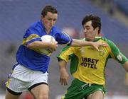 5 July 2003; Paul Cahill, Tipperary, in action against Donegal's Niall McCready. Bank of Ireland Senior Football Championship qualifier Round 3, Tipperary v Donegal, Croke Park, Dublin. Picture credit; Ray McManus / SPORTSFILE