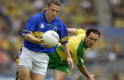 5 July 2003; Declan Browne, Tipperary, in action against Donegal's Damien Diver. Bank of Ireland Senior Football Championship qualifier Round 3, Tipperary v Donegal, Croke Park, Dublin. Picture credit; Ray McManus / SPORTSFILE