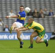 5 July 2003; Aidan Fitzgerald, Tipperary, in action against Donegal's Kevin Cassidy. Bank of Ireland Senior Football Championship qualifier Round 3, Tipperary v Donegal, Croke Park, Dublin. Picture credit; Ray McManus / SPORTSFILE