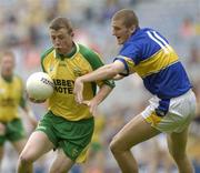 5 July 2003; Donegal's Stephen McDermott in action against Tipperary's Kevin Mulryan. Bank of Ireland Senior Football Championship Qualifier Round 3, Tipperary v Donegal, Croke Park, Dublin. Picture credit; Damien Eagers / SPORTSFILE