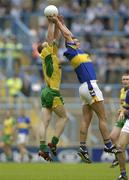 5 July 2003; Fergal O'Callaghan, Tipperary, in action against Donegal's Stephen McDermott. Bank of Ireland Senior Football Championship qualifier Round 3, Tipperary v Donegal, Croke Park, Dublin. Picture credit; Damien Eagers / SPORTSFILE