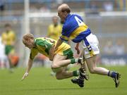 5 July 2003; Donegal's Johnny McCafferty in action against Tipperary's Liam Cronin. Bank of Ireland Senior Football Championship qualifier Round 3, Tipperary v Donegal, Croke Park, Dublin. Picture credit; Damien Eagers / SPORTSFILE