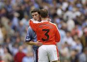 5 July 2003; Andrew McCann, Dublin, is consoled by Armagh's Enda McNulty after the game. Bank of Ireland Senior Football Championship qualifier Round 3, Dublin v Armagh, Croke Park, Dublin. Picture credit; Ray McManus / SPORTSFILE *EDI*