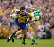 5 July 2003; Frankie Dolan, Roscommon, in action against John Kenny, Offaly. Bank of Ireland Senior Football Championship Qualifier, Round 3, Roscommon v Offaly, Cusack Park, Mullingar, Co. Westmeath. Picture credit; Brendan Moran / SPORTSFILE *EDI*