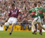 6 July 2003; Sean Og De Paor, Galway, in action against Mayo's David Heaney. Bank of Ireland Connacht Senior Football Championship Final, Galway v Mayo, Pearse Stadium, Galway. Picture credit; David Maher / SPORTSFILE *EDI*