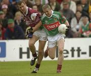 6 July 2003; Mayo's Stephen Carolan in action against Galway's Gary Fahey. Bank of Ireland Connacht Senior Football Championship Final, Galway v Mayo, Pearse Stadium, Galway. Picture credit; Damien Eagers / SPORTSFILE *EDI*