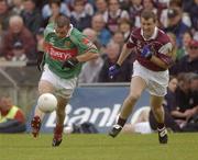 6 July 2003; Mayo's Trevor Mortimer in action against Galway's Gary Fahey. Bank of Ireland Connacht Senior Football Championship Final, Galway v Mayo, Pearse Stadium, Galway. Picture credit; Damien Eagers / SPORTSFILE *EDI*