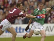6 July 2003; Mayo's Trevor Mortimer in action against Galway's Gary Fahey. Bank of Ireland Connacht Senior Football Championship Final, Galway v Mayo, Pearse Stadium, Galway. Picture credit; Damien Eagers / SPORTSFILE *EDI*