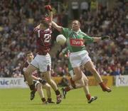6 July 2003; Nicholas Joyce, Galway, in action against Mayo's Kenneth Mortimer. Bank of Ireland Connacht Senior Football Championship Final, Galway v Mayo, Pearse Stadium, Galway. Picture credit; Damien Eagers / SPORTSFILE *EDI*