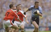 5 July 2003; Darren Homan, Dublin, in action against Armagh's Andrew McCann, 7, and Enda McNulty. Bank of Ireland Senior Football Championship qualifier Round 3, Dublin v Armagh, Croke Park, Dublin. Picture credit; Damien Eagers / SPORTSFILE *EDI*