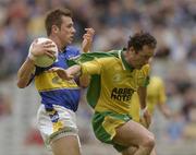 5 July 2003; Niall Fitzgerald, Tipperary, in action against Donegal's Damian Diver. Bank of Ireland Senior Football Championship Qualifier Round 3, Tipperary v Donegal, Croke Park, Dublin. Picture credit; Damien Eagers / SPORTSFILE