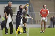 5 July 2003; Dublin manager Tommy Lyons and Armagh manager Joe Kernan look on as Armagh's Aidan O'Rourke prepares to take a sideline kick. Bank of Ireland Senior Football Championship qualifier Round 3, Dublin v Armagh, Croke Park, Dublin. Picture credit; Damien Eagers / SPORTSFILE *EDI*