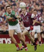 6 July 2003; Fergal Kelly, Mayo, in action against Galway's Nicholas Joyce. Bank of Ireland Connacht Senior Football Championship Final, Galway v Mayo, Pearse Stadium, Galway. Picture credit; David Maher / SPORTSFILE