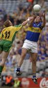 5 July 2003; Fergal O'Callaghan, Tipperary, in action against Donegal's Brian Roper. Bank of Ireland Senior Football Championship Qualifier Round 3, Tipperary v Donegal, Croke Park, Dublin. Picture credit; Damien Eagers / SPORTSFILE
