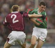 6 July 2003; Henry Gaughan, Mayo minor, in action against Galway minor Trevor Howley. Connacht Minor Football Championship Final, Galway v Mayo, Pearse Stadium, Galway. Picture credit; David Maher / SPORTSFILE *EDI*