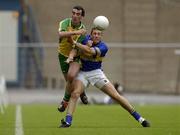 5 July 2003; Donegal's Jim McGuinness in action against Tipperary's Niall Fitzgerald. Bank of Ireland Senior Football Championship Qualifier Round 3, Tipperary v Donegal, Croke Park, Dublin. Picture credit; Damien Eagers / SPORTSFILE