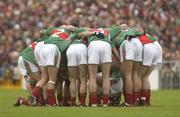 6 July 2003; The Mayo team form a huddle before the start of the game. Bank of Ireland Connacht Senior Football Championship Final, Galway v Mayo, Pearse Stadium, Galway. Picture credit; David Maher / SPORTSFILE *EDI*