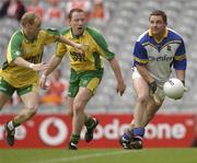 5 July 2003; Tipperary goalkeeper Philly Ryan clears from Donegal's Johnny McCafferty and Adrian Sweeney. Bank of Ireland Senior Football Championship Qualifier Round 3, Tipperary v Donegal, Croke Park, Dublin. Picture credit; Damien Eagers / SPORTSFILE