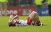 13 July 2003; Tyrone's Ryan MacMenamin holds his head after missing a late kick to win the game. Bank of Ireland Ulster Senior Football Final, Tyrone v Down, St. Tighernach's Park, Clones, Co Monaghan. Picture credit; David Maher / SPORTSFILE *EDI*