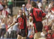 13 July 2003; Brendan Coulter, left, Down, celebrates after scoring his sides fourth goal with team-mate Dan Gordan. Bank of Ireland Ulster Senior Football Final, Tyrone v Down, St. Tighernach's Park, Clones, Co Monaghan. Picture credit; David Maher / SPORTSFILE *EDI*
