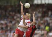 13 July 2003; Owen Mulligan, Tyrone, in action against Down's Alan Molloy. Bank of Ireland Ulster Senior Football Final, Tyrone v Down, St. Tighernach's Park, Clones, Co Monaghan. Picture credit; David Maher / SPORTSFILE *EDI*