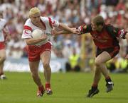 13 July 2003; Owen Mulligan, Tyrone, in action against Down's Alan Molloy. Bank of Ireland Ulster Senior Football Final, Tyrone v Down, St. Tighernach's Park, Clones, Co Monaghan. Picture credit; David Maher / SPORTSFILE *EDI*